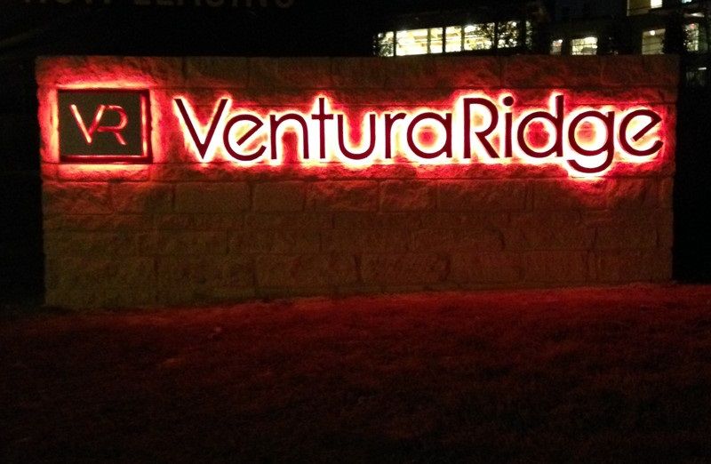 Lighted sign for apartment complex